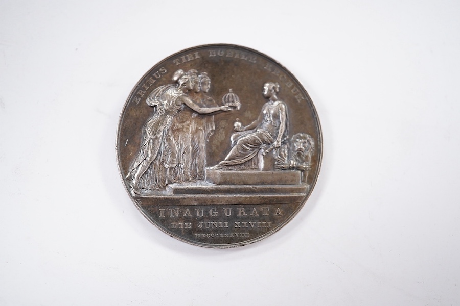 British Royal commemorative medals, Victoria Coronation, 1838, a silver medal by B. Pistrucci, diademed bust left, rev. Victoria seated left, being offered the crown by Britannia, Scotia, and Hibernia, 37mm, (W & E 88A.2